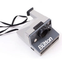 Polaroid The Button Fotovramke 